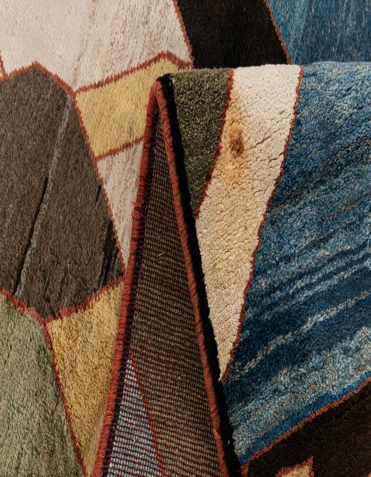 Detail image of  3' 11 x 8' 7  Hand Knotted Gabbeh Wool Round Rug