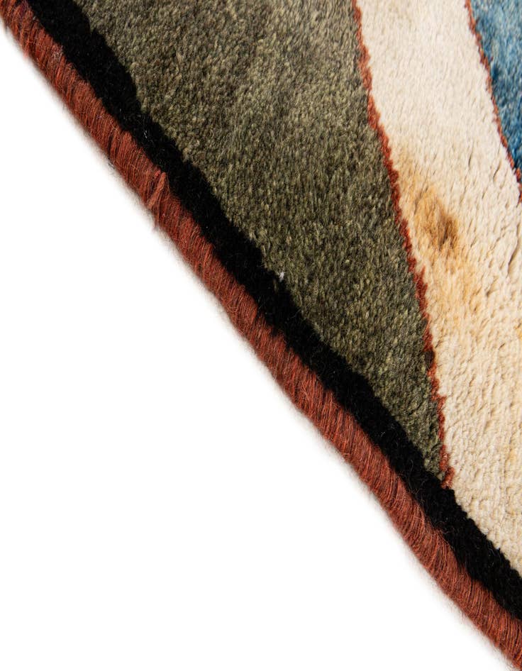 Detail image of  3' 11 x 8' 7  Hand Knotted Gabbeh Wool Round Rug