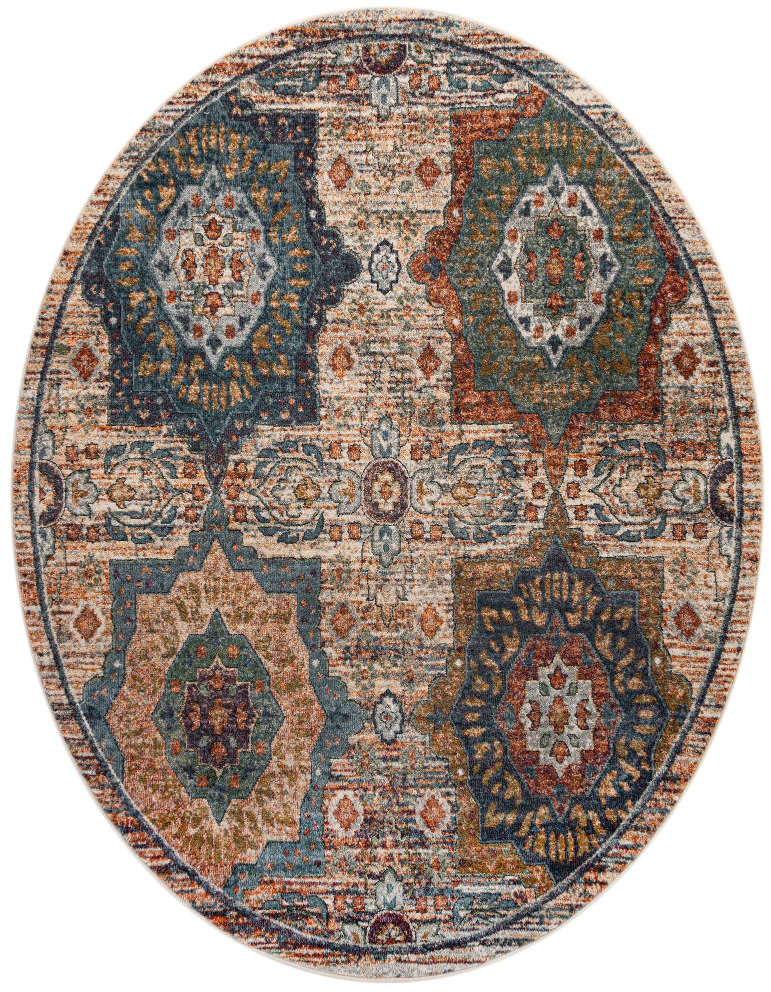 A round, multi-colored modern rug with a distressed look, featuring intricate medallion and floral patterns in teal, orange, and beige tones.
