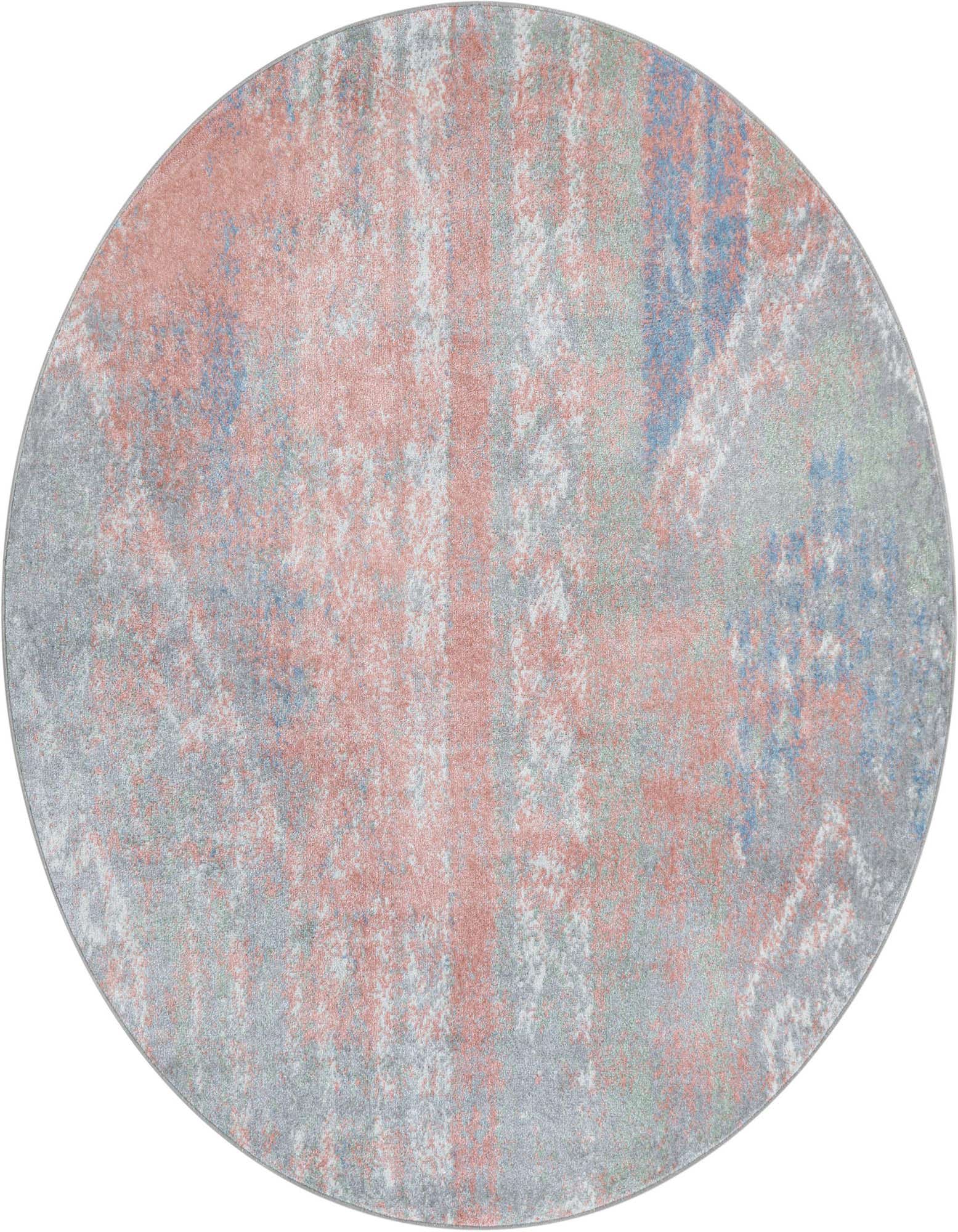 A 5' 3 round multi-colored Southwestern vintage rug with a flat pile, featuring distressed pink, blue, and gray tones.