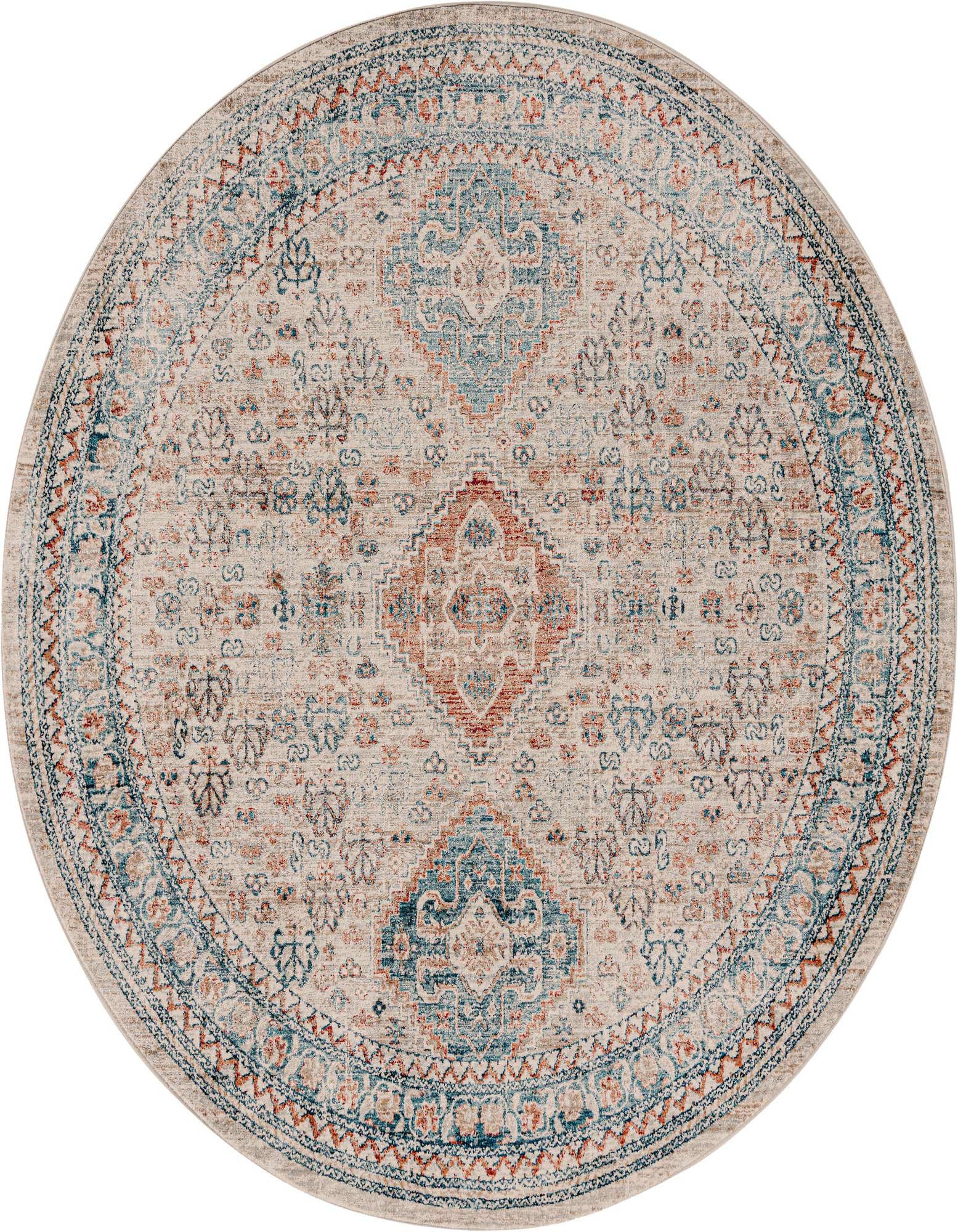 A 7' round multi-colored polypropylene rug featuring a traditional medallion and tribal pattern in teal, rust, and beige.