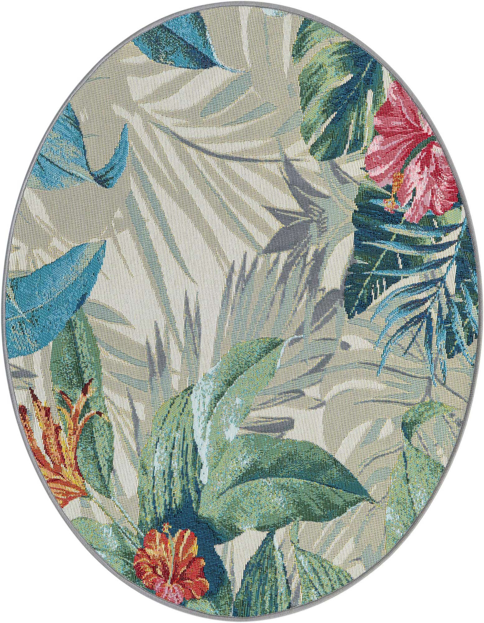 A round, multi-colored botanical rug featuring large green, blue, and red tropical leaves and flowers on a light background.