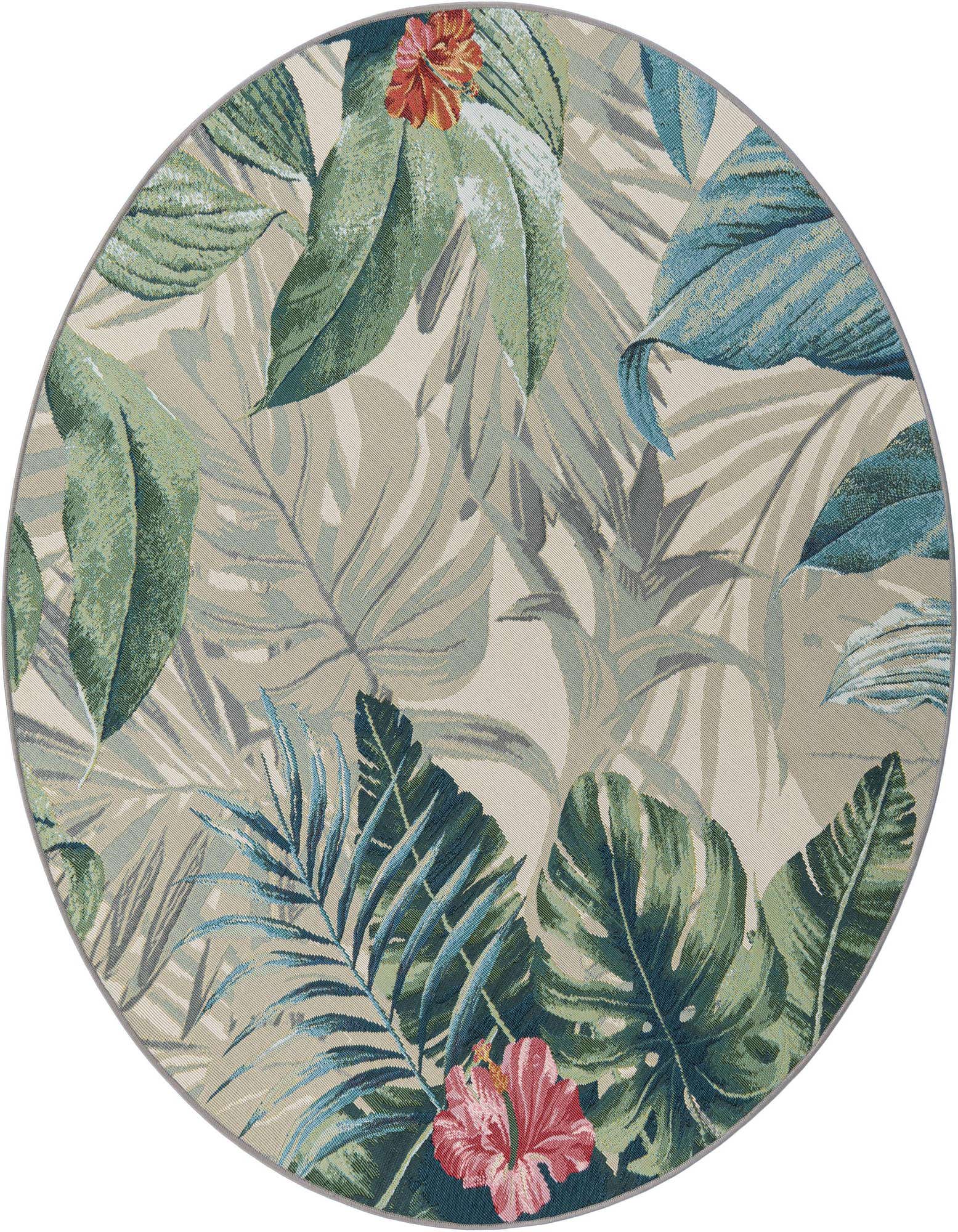 A 6' round multi-colored botanical rug featuring large green, blue, and beige leaves with vibrant red hibiscus flowers.