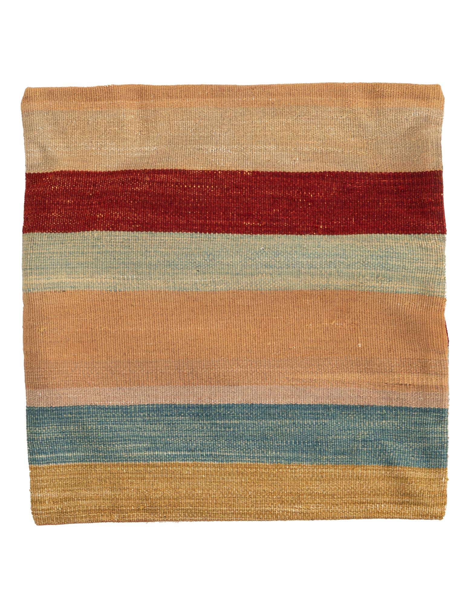 A round, multi-colored wool rug featuring horizontal stripes in varying shades of red, blue, and tan.
