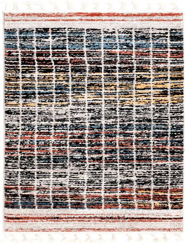 A multi-colored modern runner rug with a high pile, featuring a grid-like stripe pattern in black, blue, yellow, and orange on a cream background, with decorative tassels.