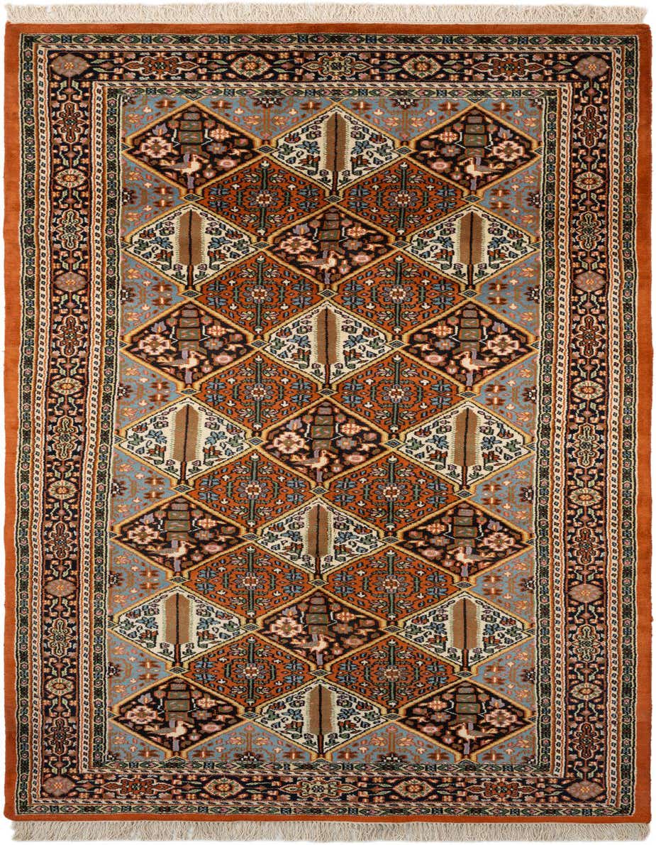 A multi-colored 11 ft runner rug with a tribal, traditional pattern featuring diamonds and intricate floral and bird motifs, ideal for a hallway.