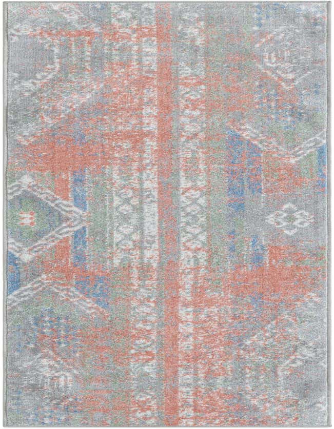 A 6 ft runner rug with a distressed Southwestern and vintage pattern in multi-colored hues of grey, coral, blue, and green.