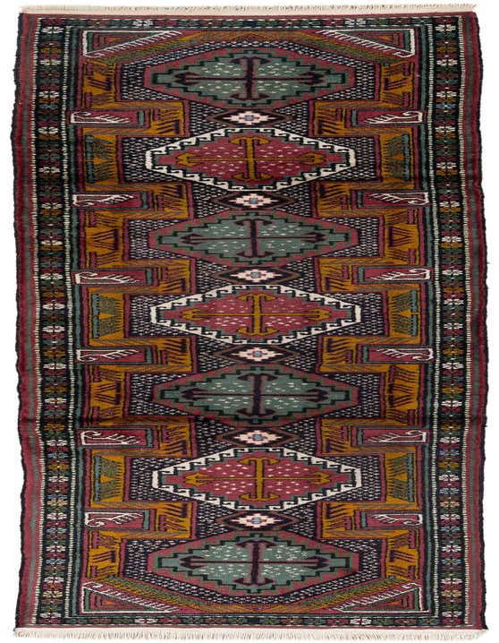 A 10 ft multi-colored wool runner rug with a traditional Oriental pattern, featuring geometric shapes in red, green, and gold, perfect for a hallway.