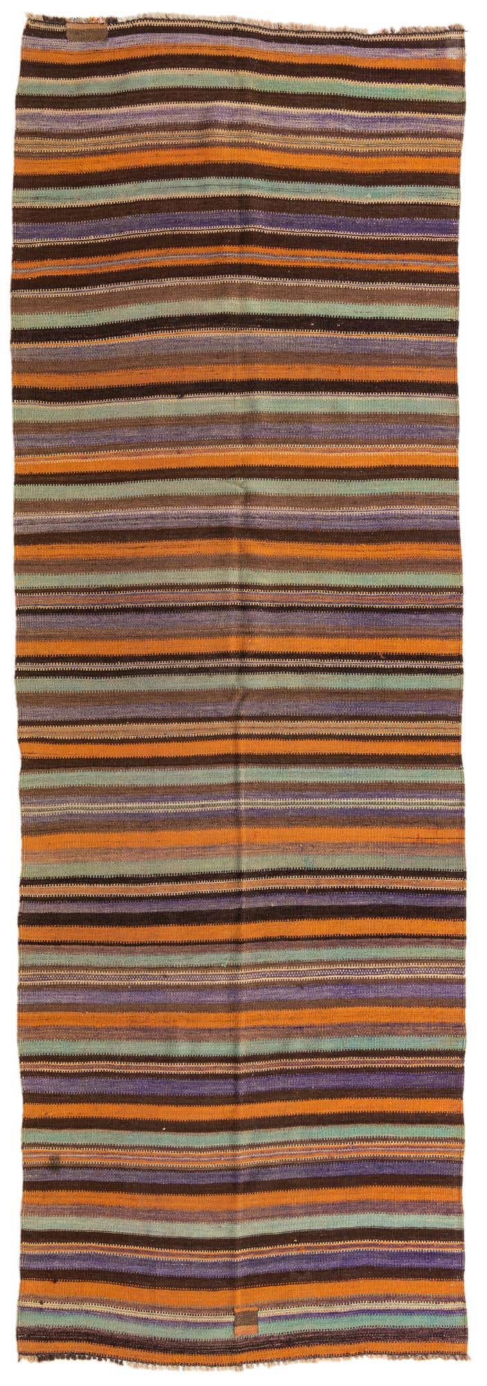 A 13 ft runner rug featuring horizontal stripes in various shades of orange, purple, brown, and light green, ideal for a hallway.