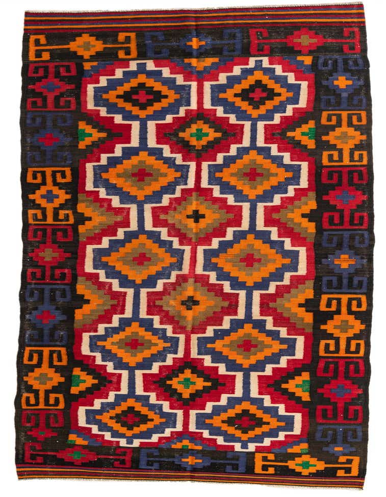 A vibrant 13 ft runner rug featuring a multi-colored tribal geometric pattern with red, blue, orange, and black hues, ideal for a hallway.