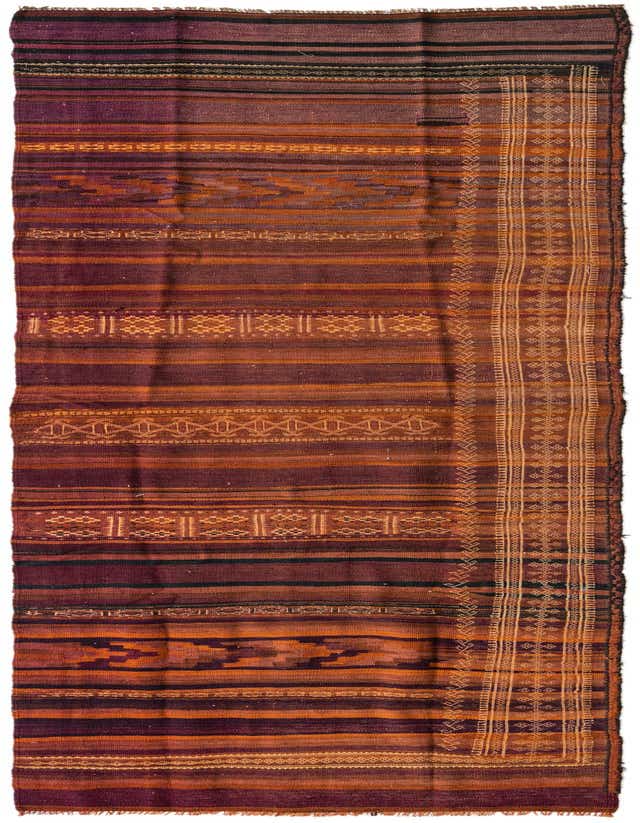 A 12 ft runner rug from the Kilim Fars collection, featuring multi-colored stripes and tribal patterns in shades of purple, orange, and black.