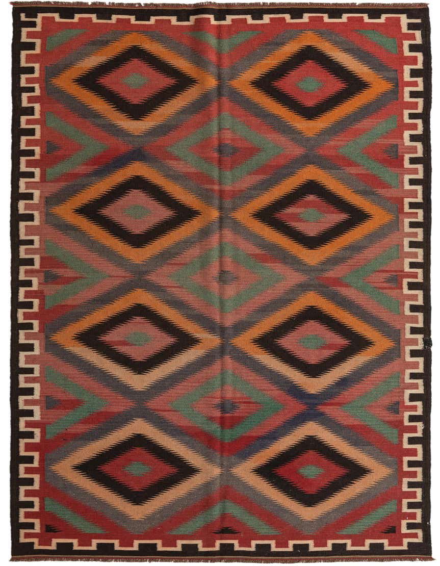A 12 ft runner rug, the Kilim Fars features a vibrant multi-colored tribal geometric pattern with large diamonds and a border.