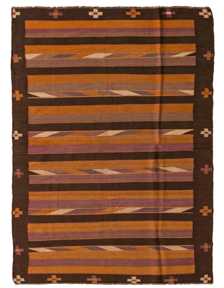 A 12 ft runner rug from the Kilim Fars collection, featuring multi-colored stripes and tribal patterns on a flatweave wool surface, ideal for a hallway.