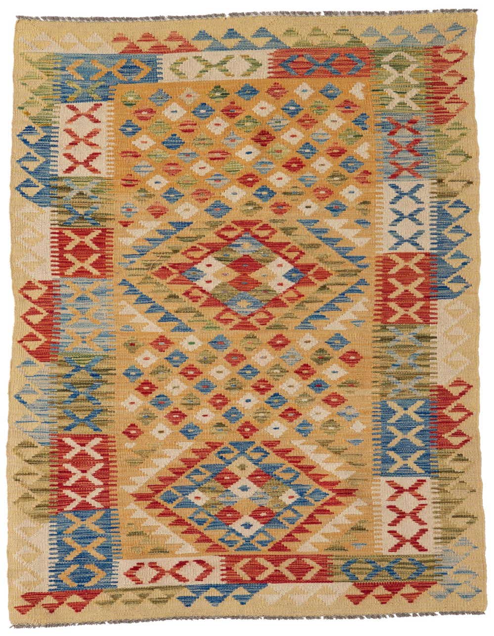 A 7 Ft runner rug with a multi-colored Southwestern tribal pattern, featuring diamonds and X shapes in red, blue, green, and cream on a warm beige background.