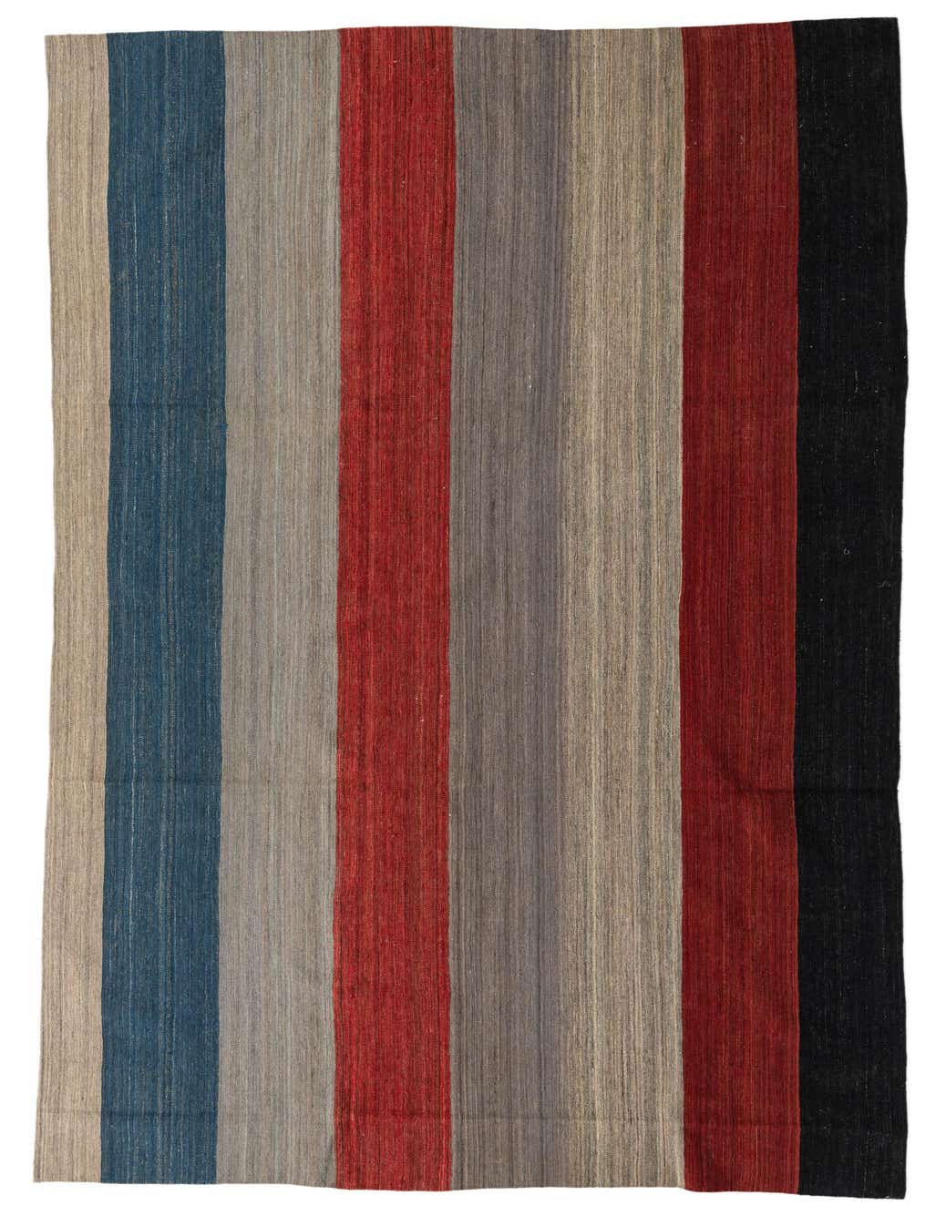 A 13 ft runner rug with bold vertical stripes in blue, red, beige, gray, and black, showcasing a flatweave texture.