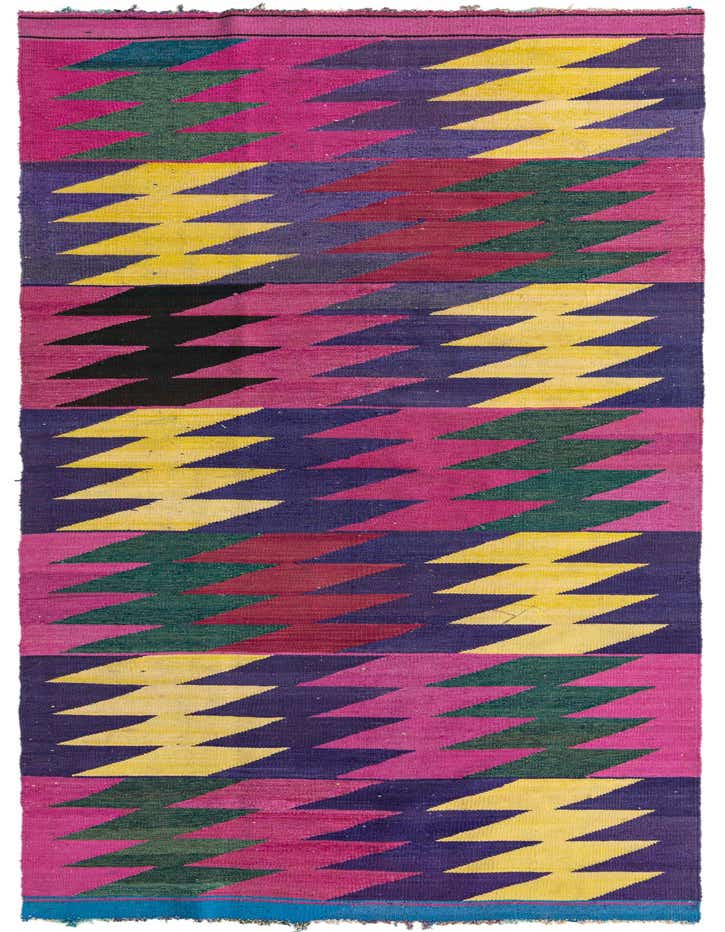 A vibrant 11 Ft runner rug with a multi-colored tribal zigzag pattern in fuchsia, purple, yellow, green, and black.