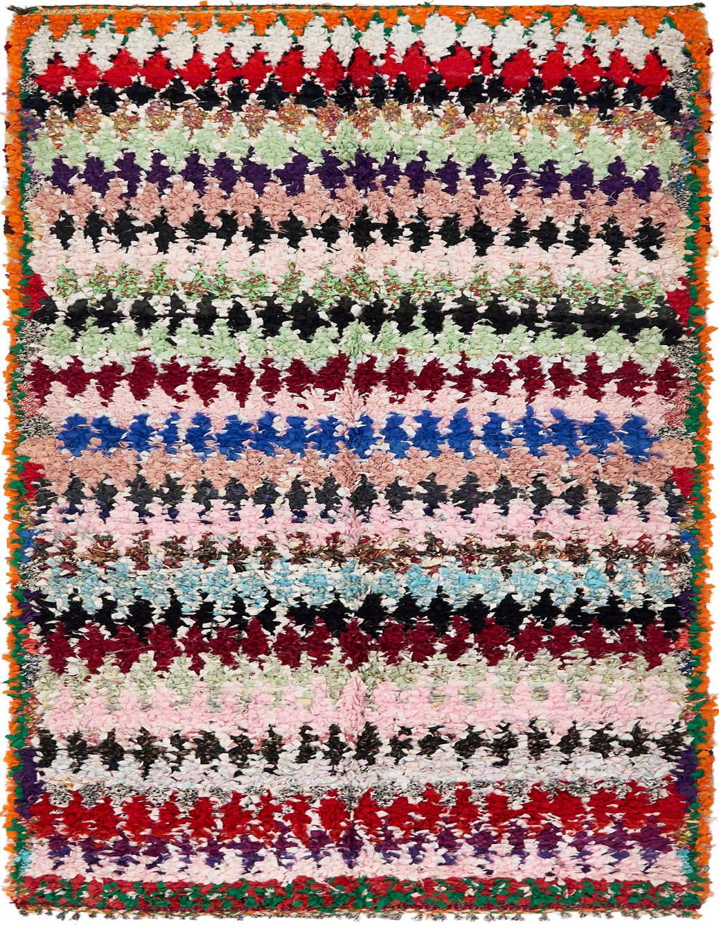 A vibrant multi-colored 10 ft runner rug with a shag pile, featuring horizontal stripes of various tribal patterns.
