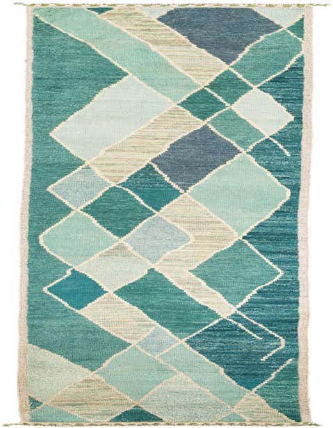 A 14 ft Moroccan runner rug with a multi-colored diamond pattern in shades of teal, blue, and cream, ideal for a hallway.