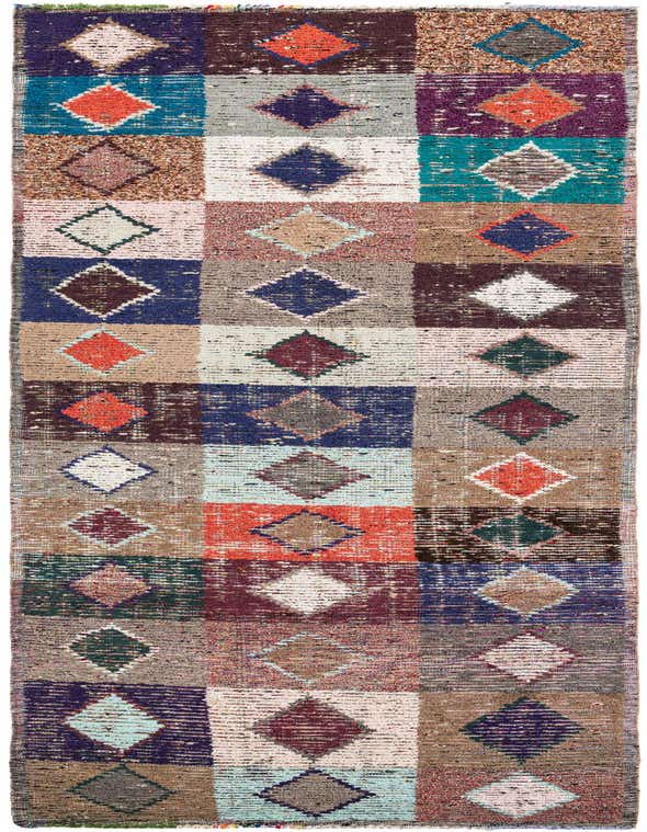 A vibrant 16 ft multi-colored wool runner rug with a tribal diamond pattern, perfect for a hallway.