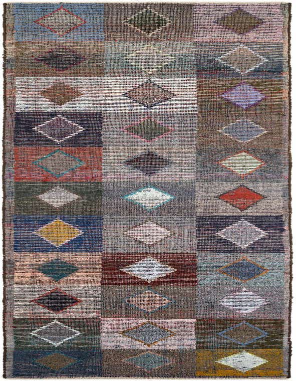 A 16 ft multi-colored wool runner rug with a tribal geometric pattern of diamonds within squares, ideal for a hallway.