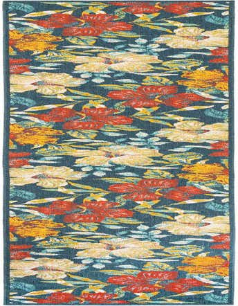 A 16 ft runner rug featuring a vibrant coastal floral pattern with large red, yellow, and cream hibiscus flowers and teal leaves on a dark blue background.