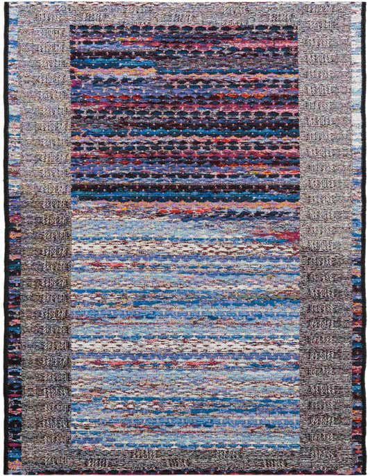 A 10 Ft Multi-colored Modern Stripe runner rug with a flatweave texture, suitable for a hallway or patio.