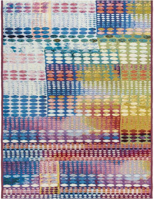 A 10 ft multi-colored runner rug with a modern abstract pattern of various sized dots in blues, pinks, yellows, and greens.