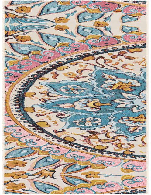 A multi-colored 8 ft runner rug with a vibrant traditional medallion pattern in teal, pink, and gold on a cream background.