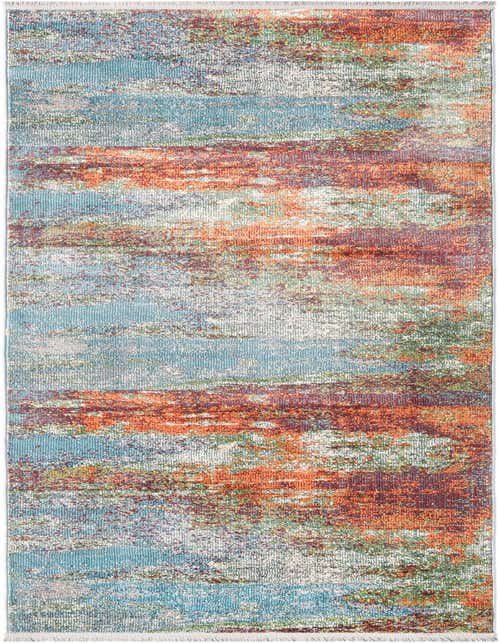 A 10 ft runner rug with an abstract, modern pattern in shades of blue, orange, green, and white, ideal for a hallway.