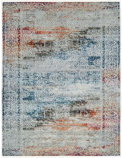 A 10 ft multi-colored runner rug with a distressed Bohemian and Traditional pattern, featuring shades of blue, orange, and red.