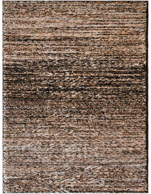 A long, narrow 8 ft runner rug with a modern abstract pattern in multi-colored tones of black, brown, and white, featuring a textured pile.