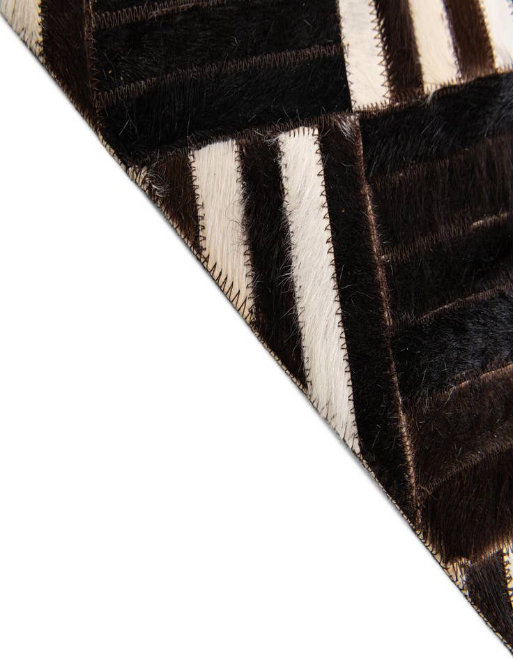 Detail image of  5' 11 x 6' 7 Cowhide Stocks Square Rug