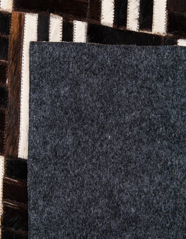 Detail image of  5' 11 x 6' 7 Cowhide Stocks Square Rug
