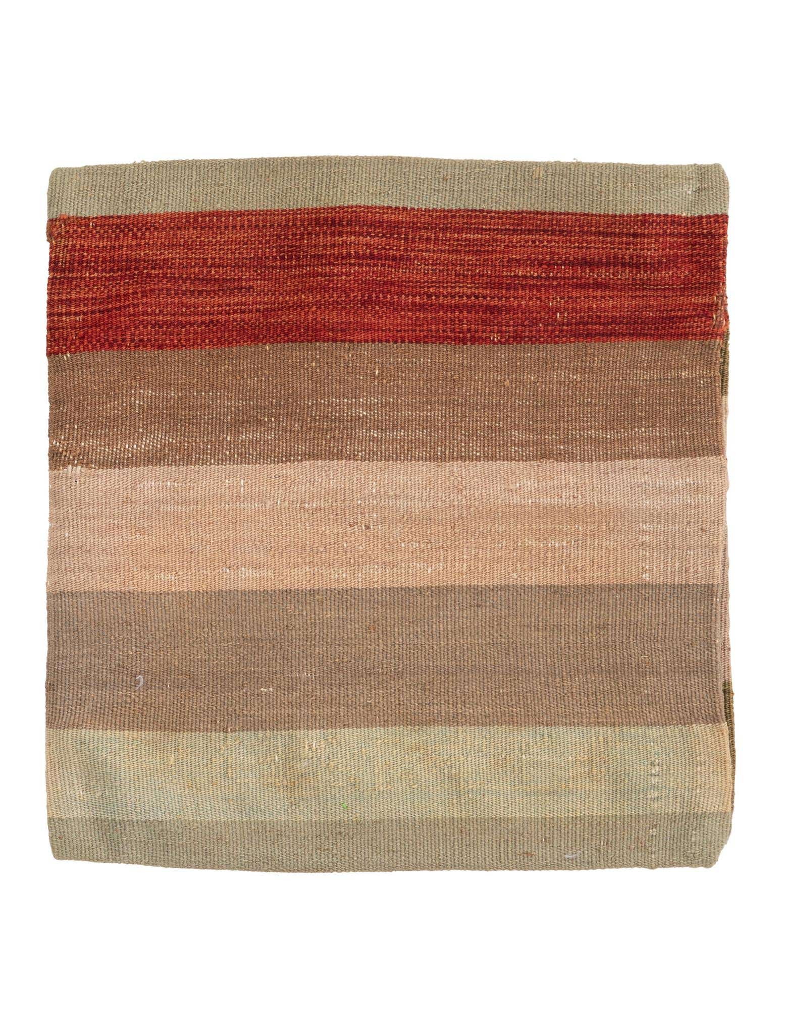 A square, multi-colored wool rug featuring horizontal stripes in shades of red, brown, peach, and green.
