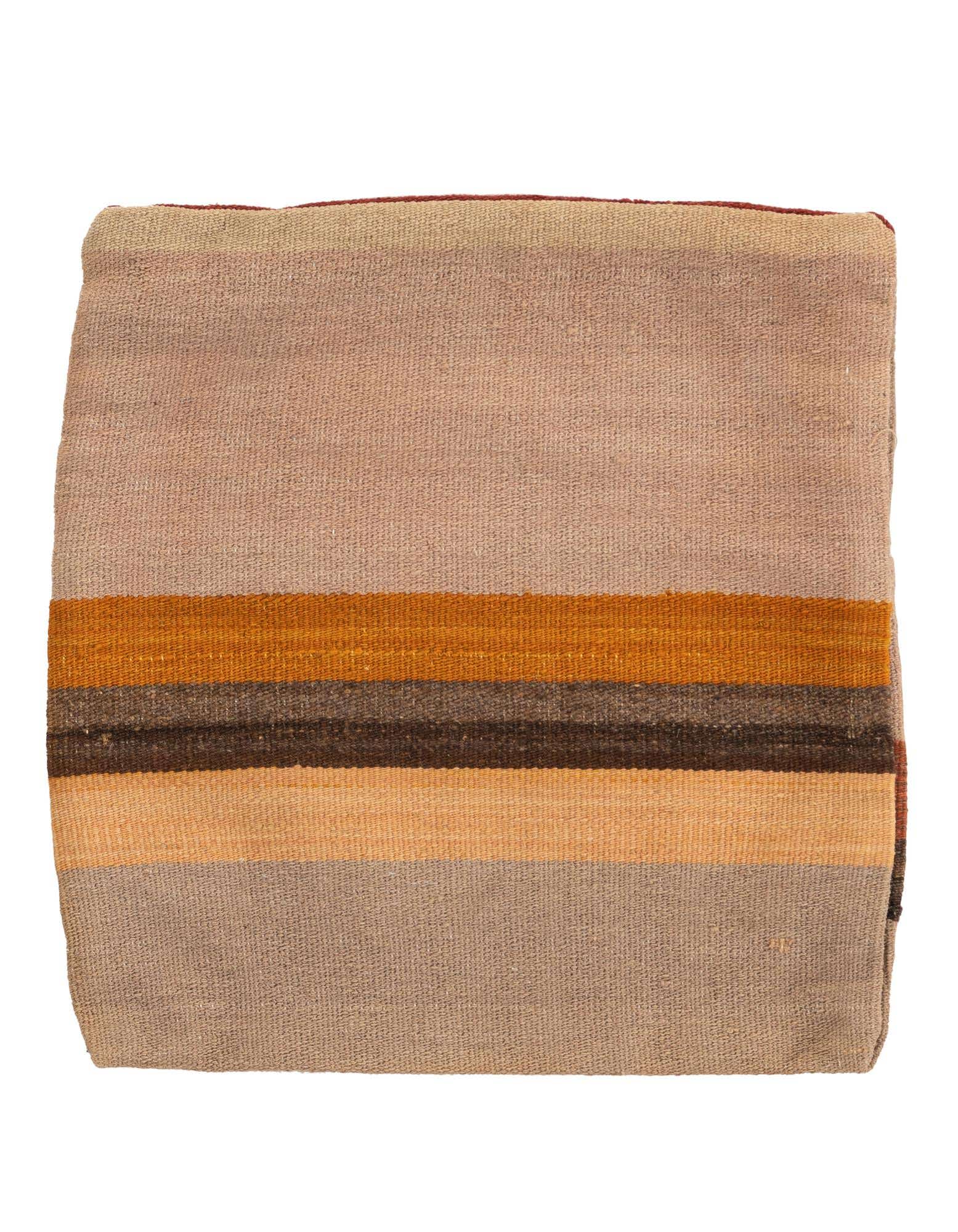 Folded 1' 7 x 1' 7 square wool rug with horizontal stripes in shades of brown, orange, and beige.