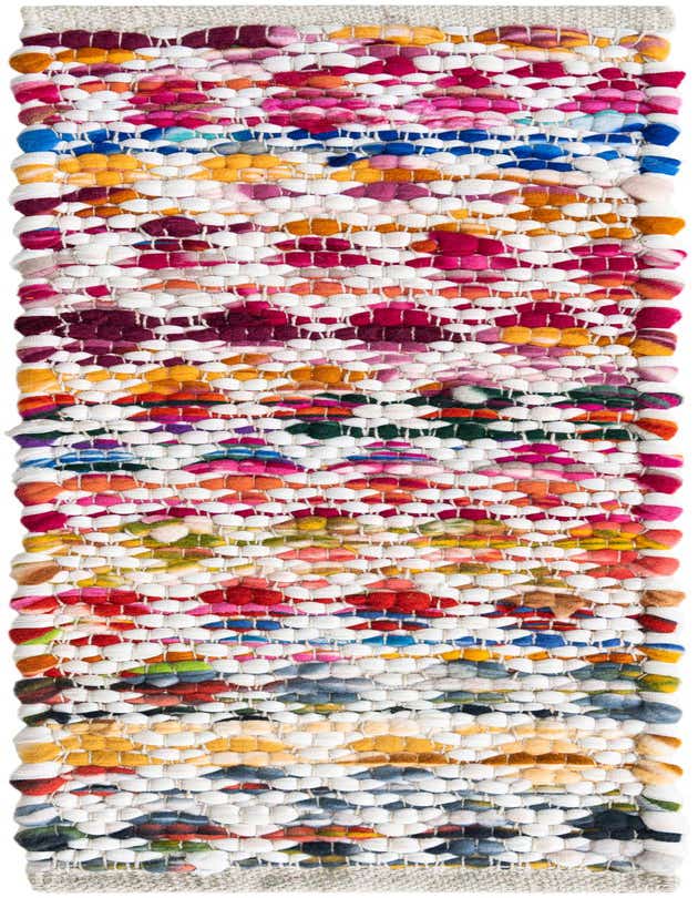 A colorful, multi-colored Braided Chindi stair rug with a textured, high pile, featuring a modern abstract pattern.