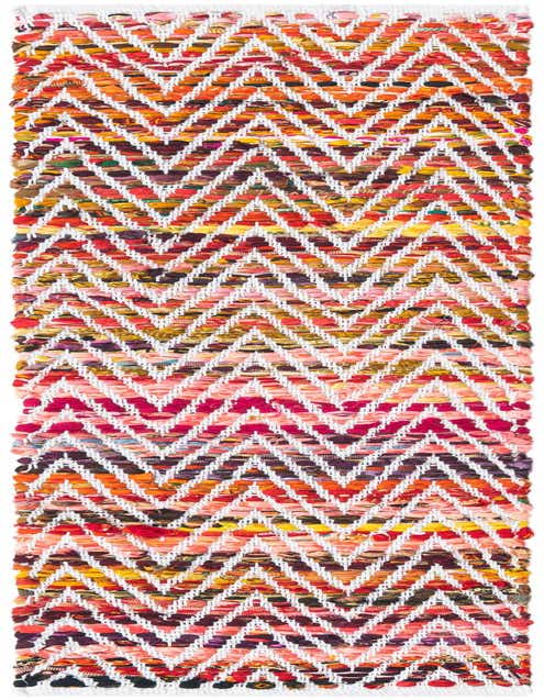 A vibrant 1' 2 x 5' 1 multi-colored Chindi Chevron runner rug with a distinct zigzag pattern, crafted from recycled cotton.