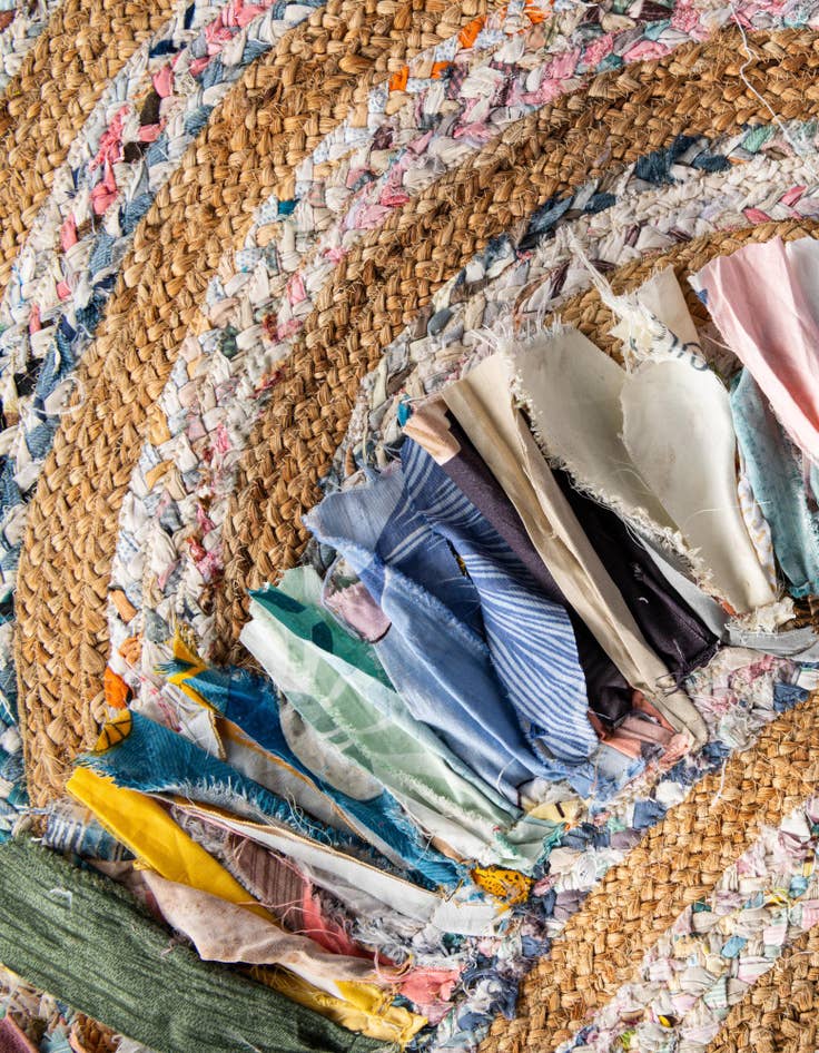 Detail image of  7' 10 x 10'  Hand Braided Chindi Jute Oval Rug