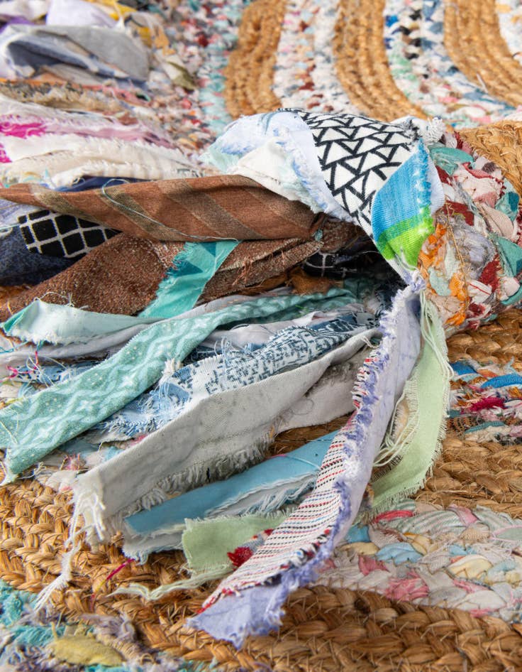 Detail image of  7' 10 x 7' 10  Hand Braided Chindi Jute Round Rug