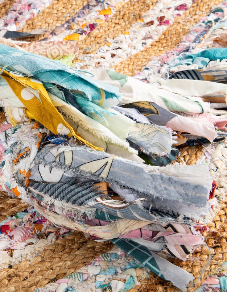 Detail image of  7' 10 x 7' 10  Hand Braided Chindi Jute Round Rug