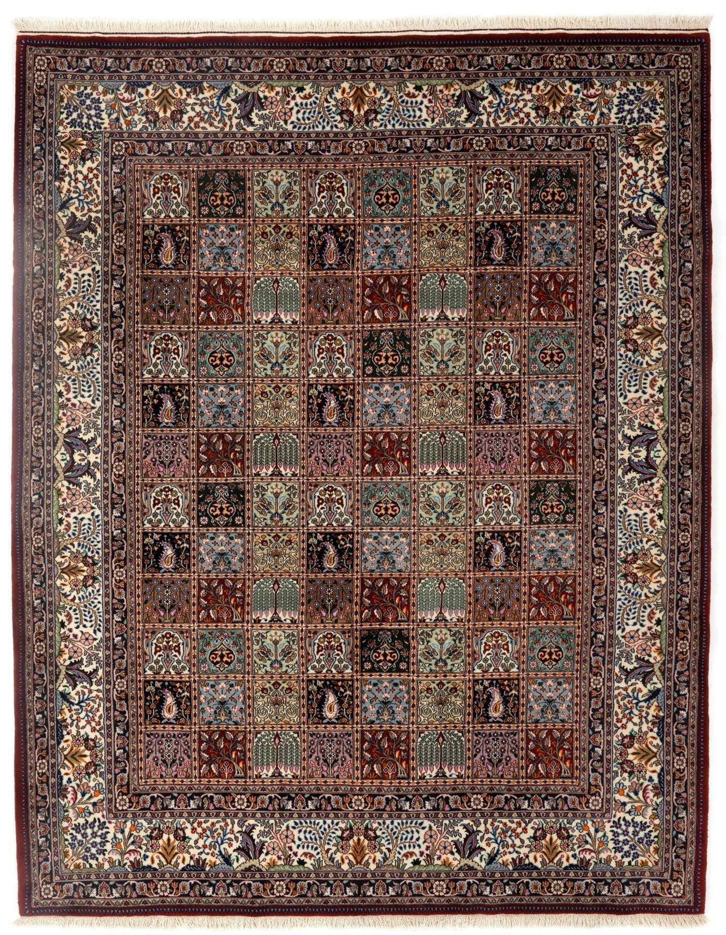 A 7x10 rectangular Multicolor Persian Birjend rug with a grid pattern of floral and paisley motifs, framed by an intricate border.