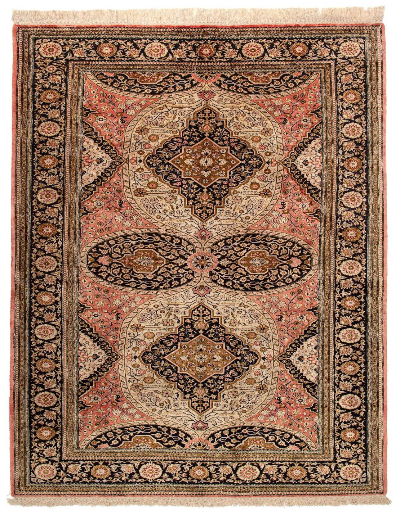 A 5x7 rectangular Persian rug featuring intricate floral and medallion patterns in shades of pink, black, and beige.