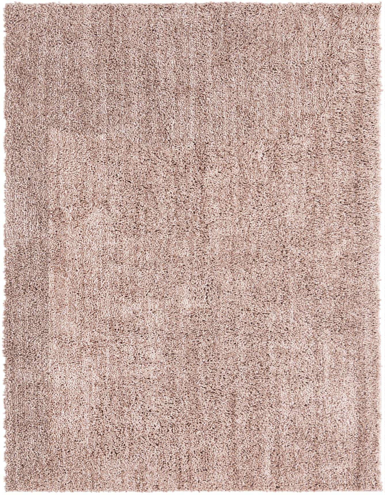 A rectangular 4x6 Jill Zarin Shaggy Chic rug in a solid brown/tan color with a plush shag pile.