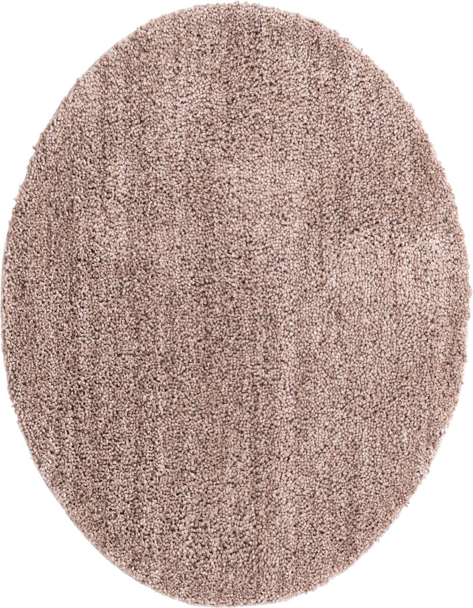 A 3' 3 x 3' 3 round Jill Zarin Shaggy Chic rug in a solid brown/tan color, featuring a soft, textured shag pile.