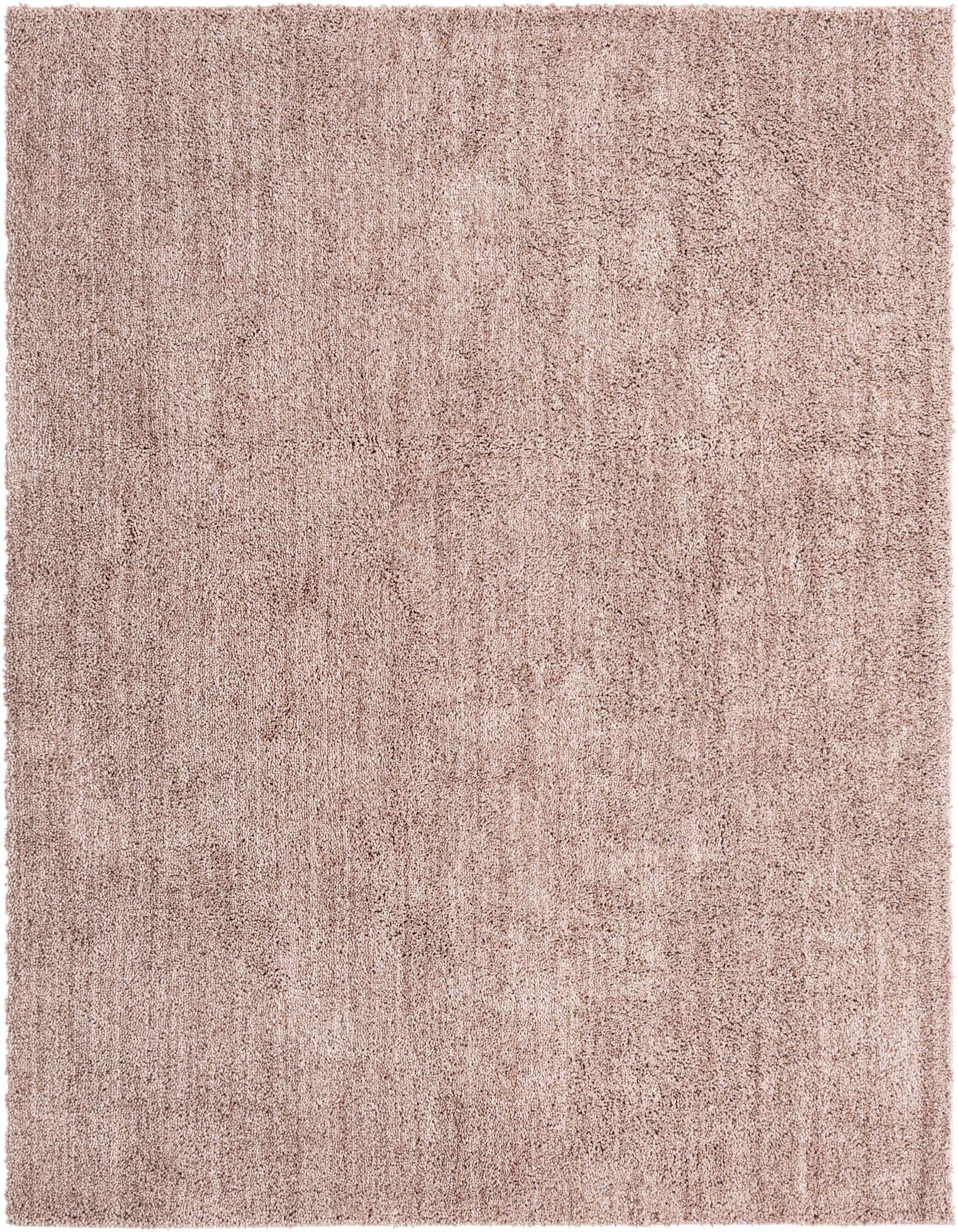 A soft, plush square shag rug in varying shades of brown and tan, showcasing its textured pile.