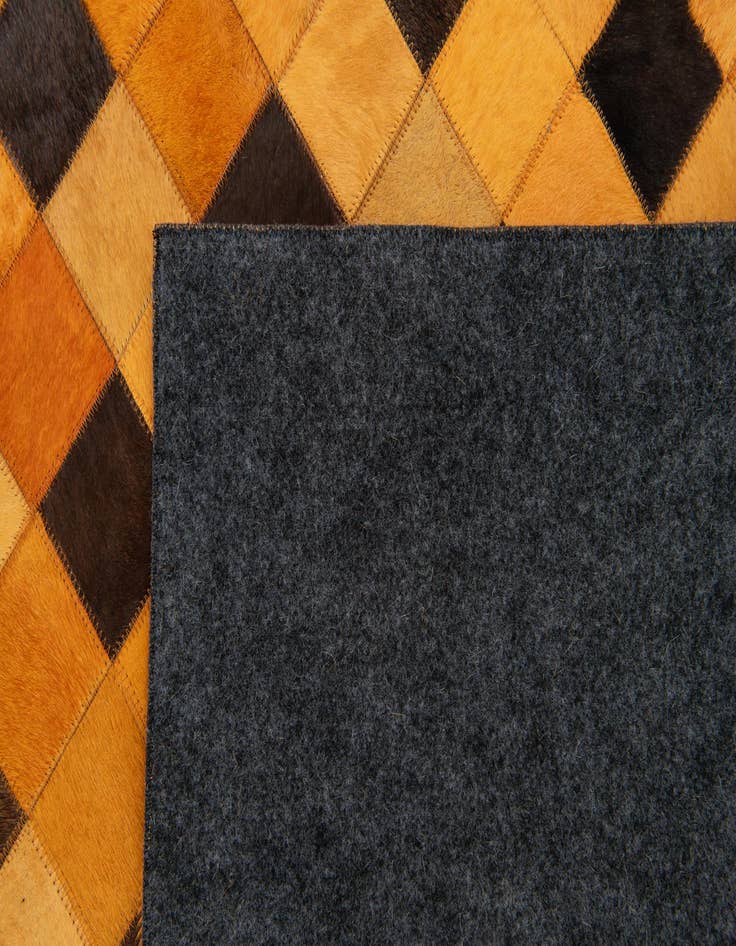 Detail image of  5' 2 x 8' Cowhide Stocks Rug