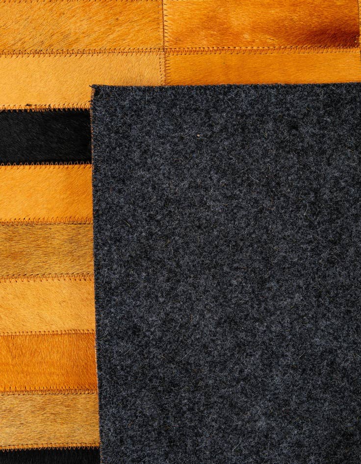 Detail image of  4' 11 x 8' Cowhide - Patchwork Rug