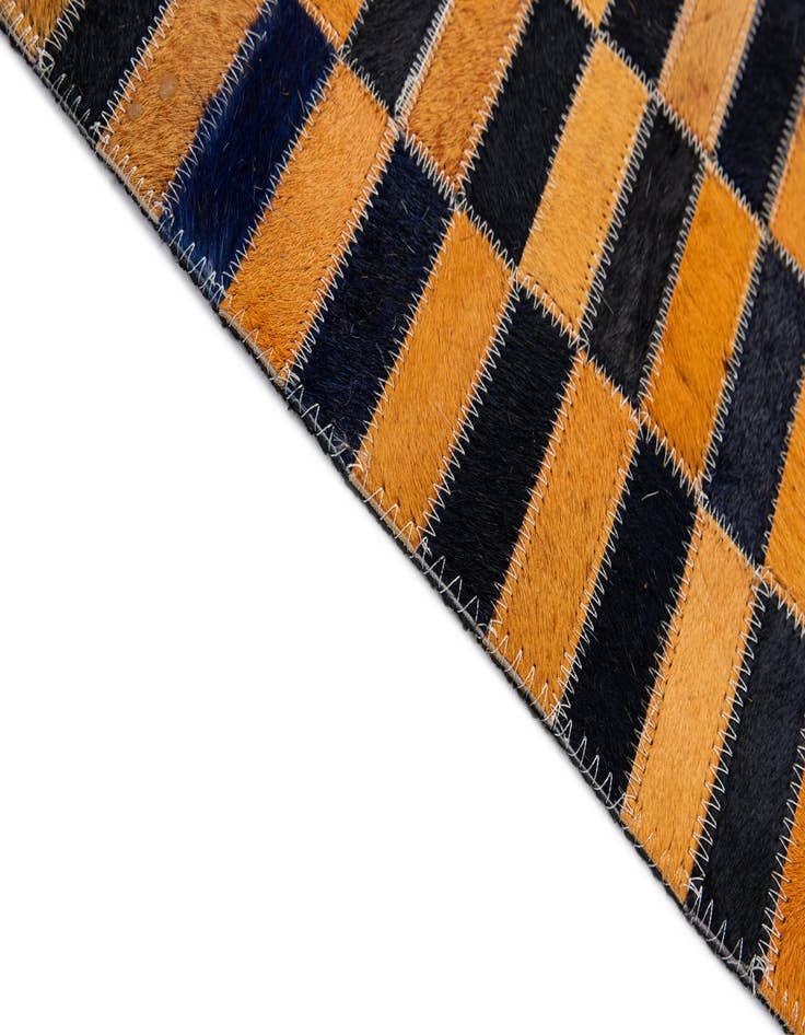 Detail image of  5' 1 x 7' 11 Cowhide - Patchwork Rug