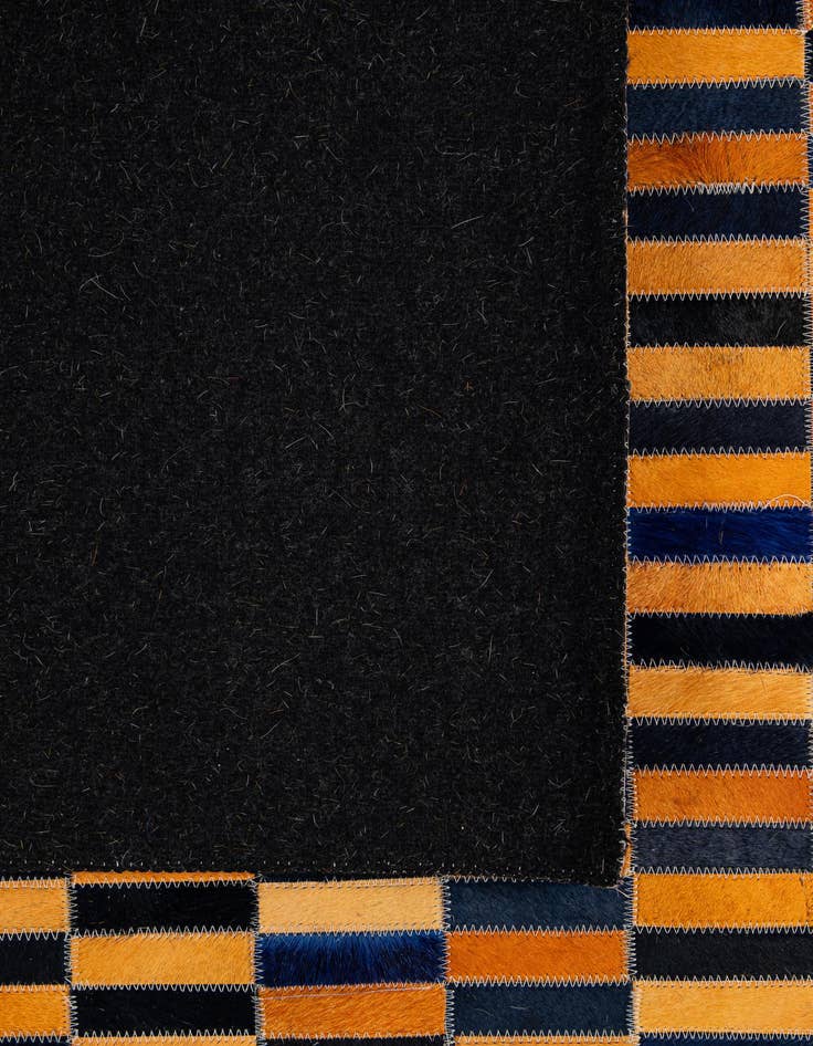 Detail image of  5' 1 x 7' 11 Cowhide - Patchwork Rug