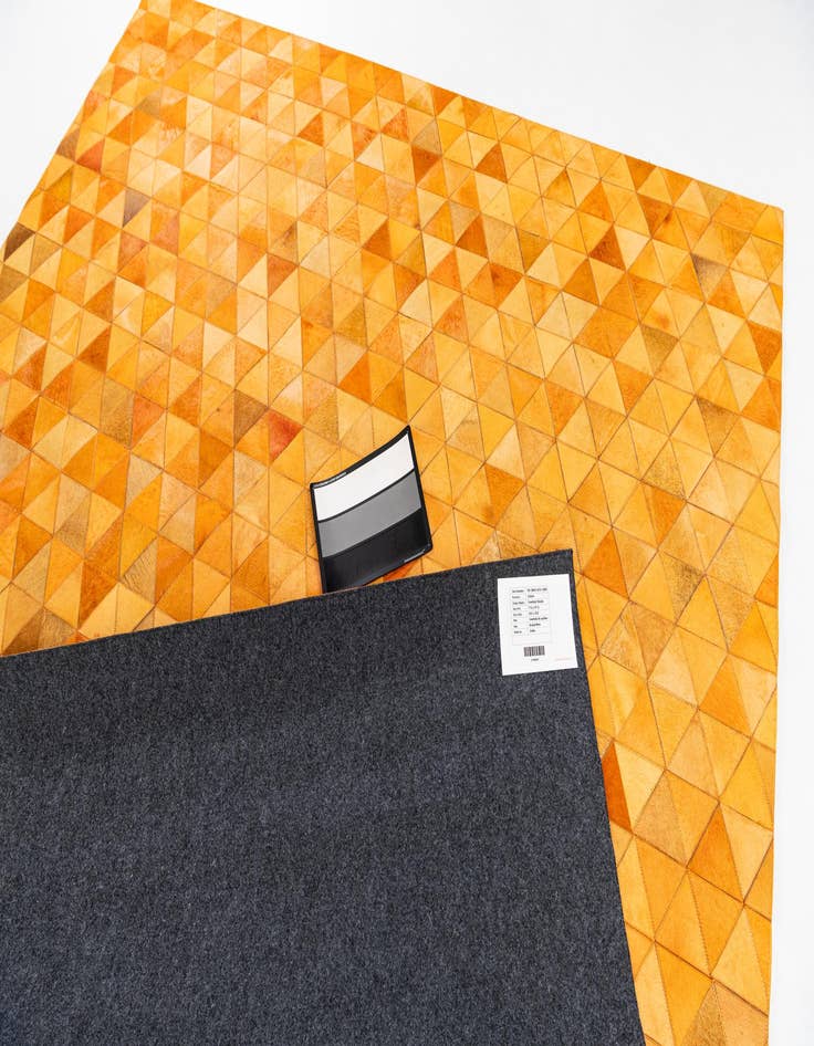 Detail image of  7' 11 x 9' 11 Cowhide Stocks Rug